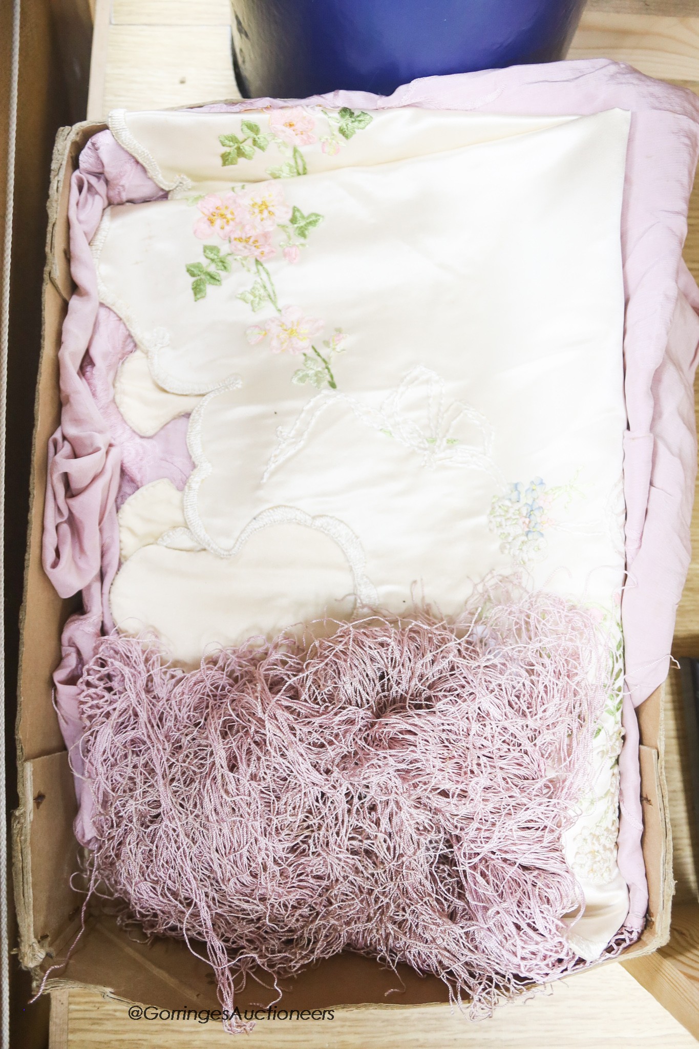 A lilac silk embroidered shawl, a ribbonwork satin table centre and two fine wool embroidered stoles